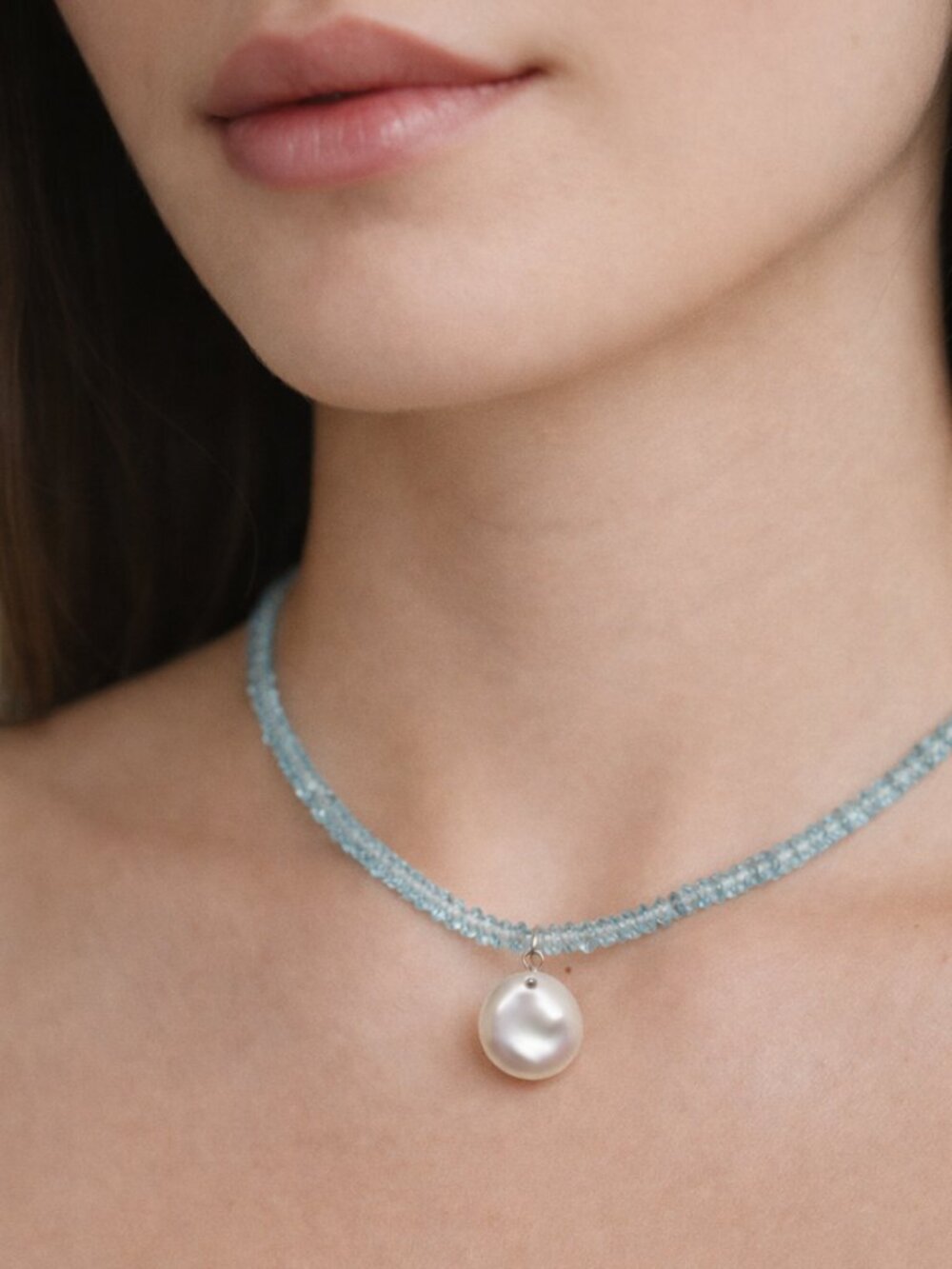 Faceted Donut Blue Topaz and Freshwater Pearl Necklace.